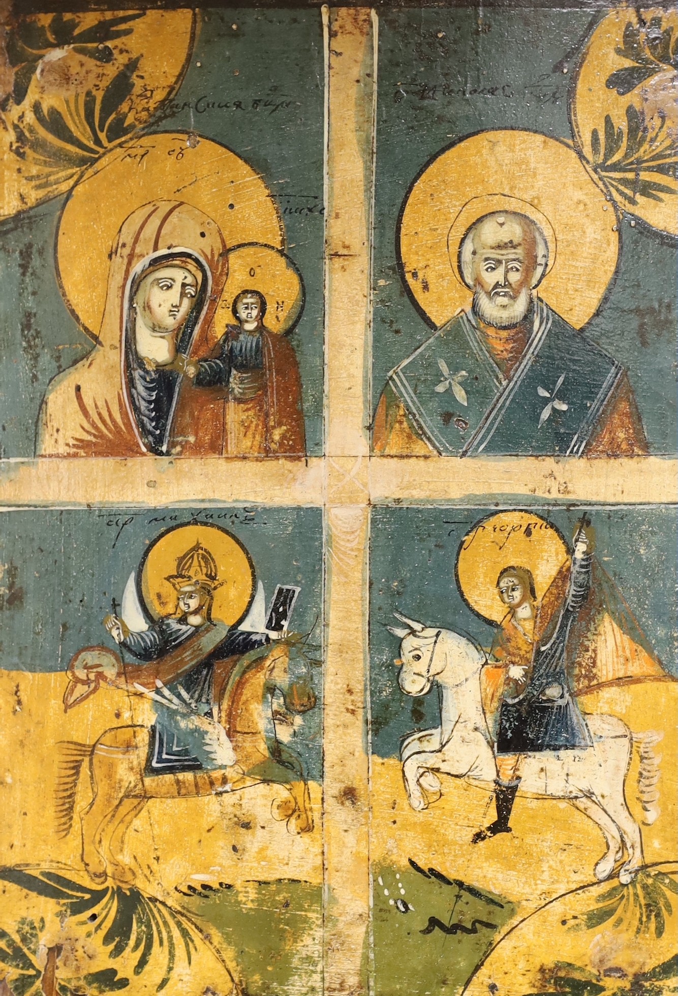 Eastern European School, tempera on wooden panel, Icon divided into four panels, 30 x 22cm, unframed